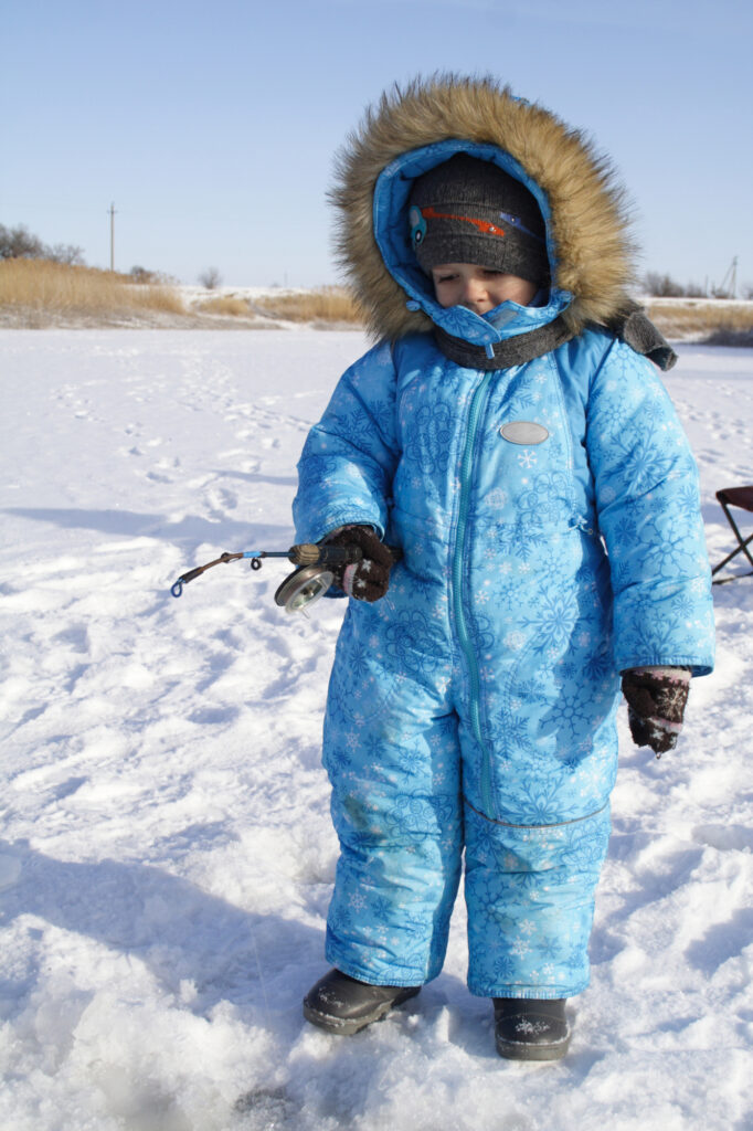 4 year old boy on winter fishing
