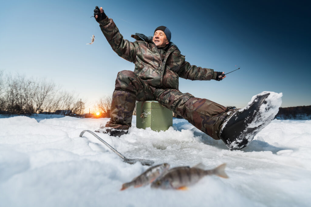 Fisherman happy while ice fishing